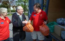 David Fowler hands over part of Loddon Valley\\\\'s contribution to Petersfield Lions Club Spec Trek 2011