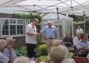 Tim (left) about to present Bob with his Past President Pin