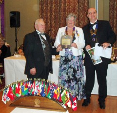 Guy Elliott receives his award