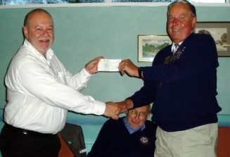 Phil Hatto receives the cheque for Kestrel Kids from LVLC President John Goodchild