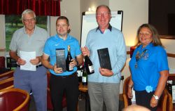 The winners receiving their prizes