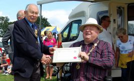 Lion President David Fowler Receiving the Award on behalf of the Lions from Cllr David Leeks, Chairman, Tadley Town Council