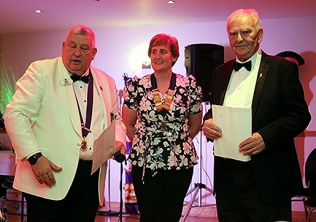 DG David (L), Lion President Jane (C) and, Barry Germain (with his award)